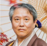 手塚 建一 氏